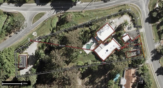 Aerial of 1 Baileys Road, Tallai QLD 4213 with the block outlined