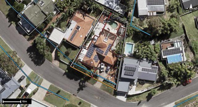 Aerial of 12 Currant Street, Elanora QLD 4221 with the block outlined