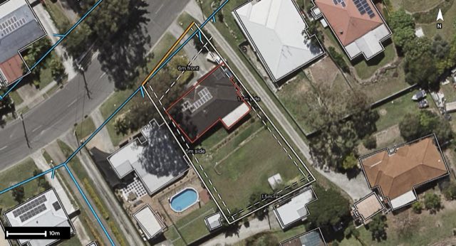 Aerial of 15 Avonmore Street, Edens Landing QLD 4207 with the block outlined