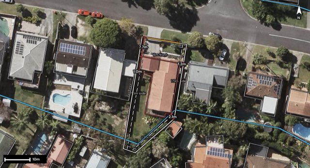 Aerial of 22 Pinkwood Drive, Ashmore QLD 4214 with the lot and setbacks drawn on