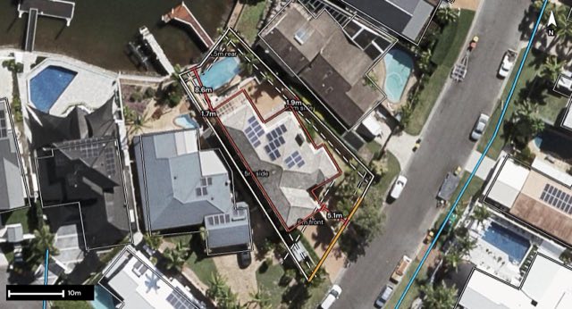 Aerial of 23 Sundance Way, Runaway Bay QLD 4216 with the block outlined