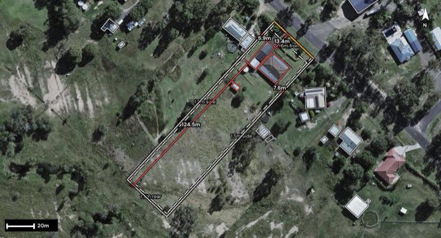 Aerial of 82 Hewett Drive, Regency Downs QLD 4341 with the block outlined