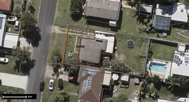 Aerial of 9 Weaber Street, Clontarf QLD 4019 with the block outlined