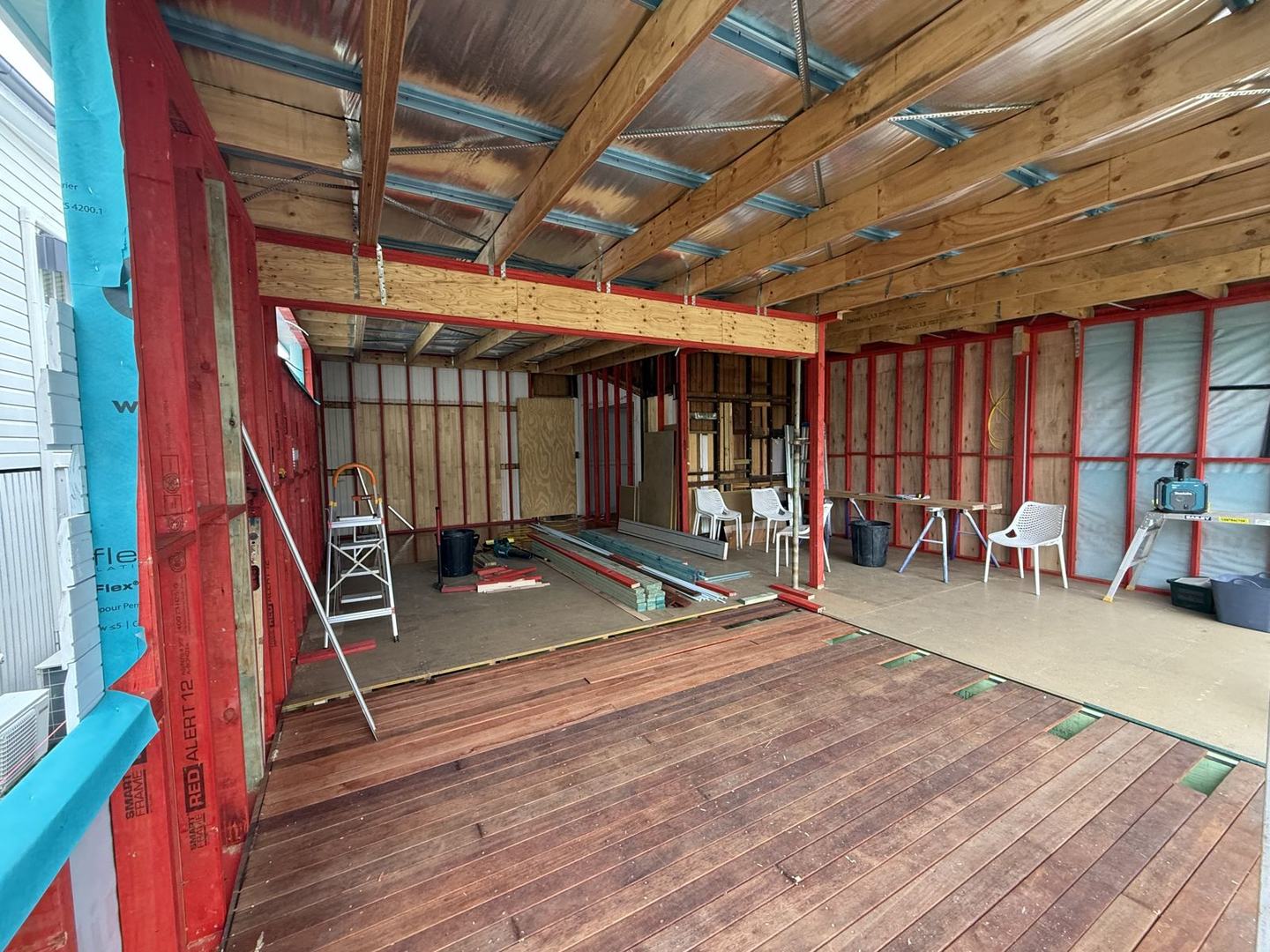 A framed timber extension on an old Queenslander with a new hardwood floor