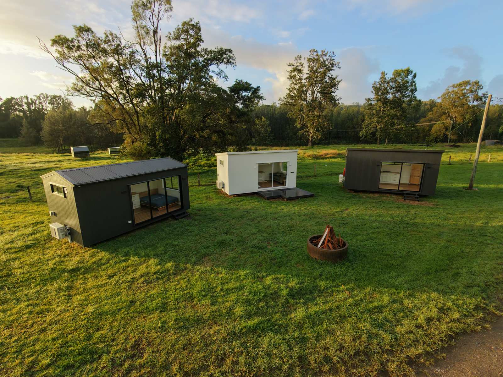 Three finished second homes seen from above